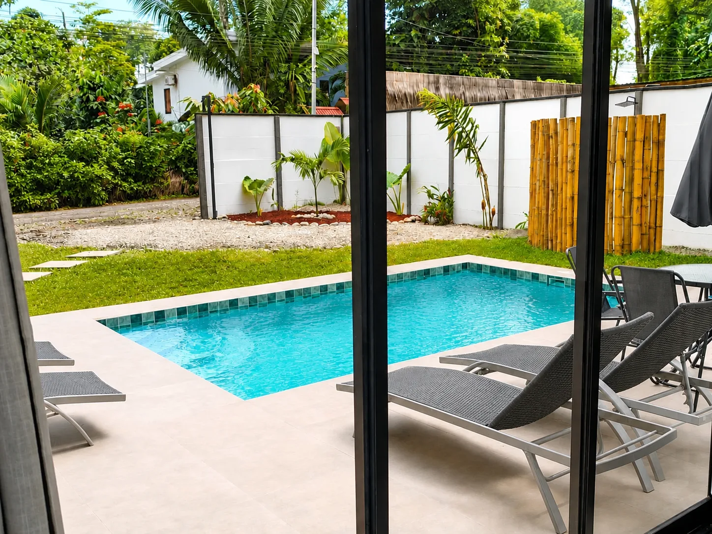 Poolside loungers at Villa Isora